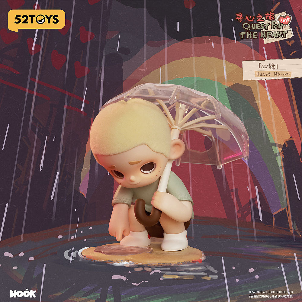 Figurine of a character with a transparent umbrella in a rain scene with a rainbow, featuring 52TOYS branding.
