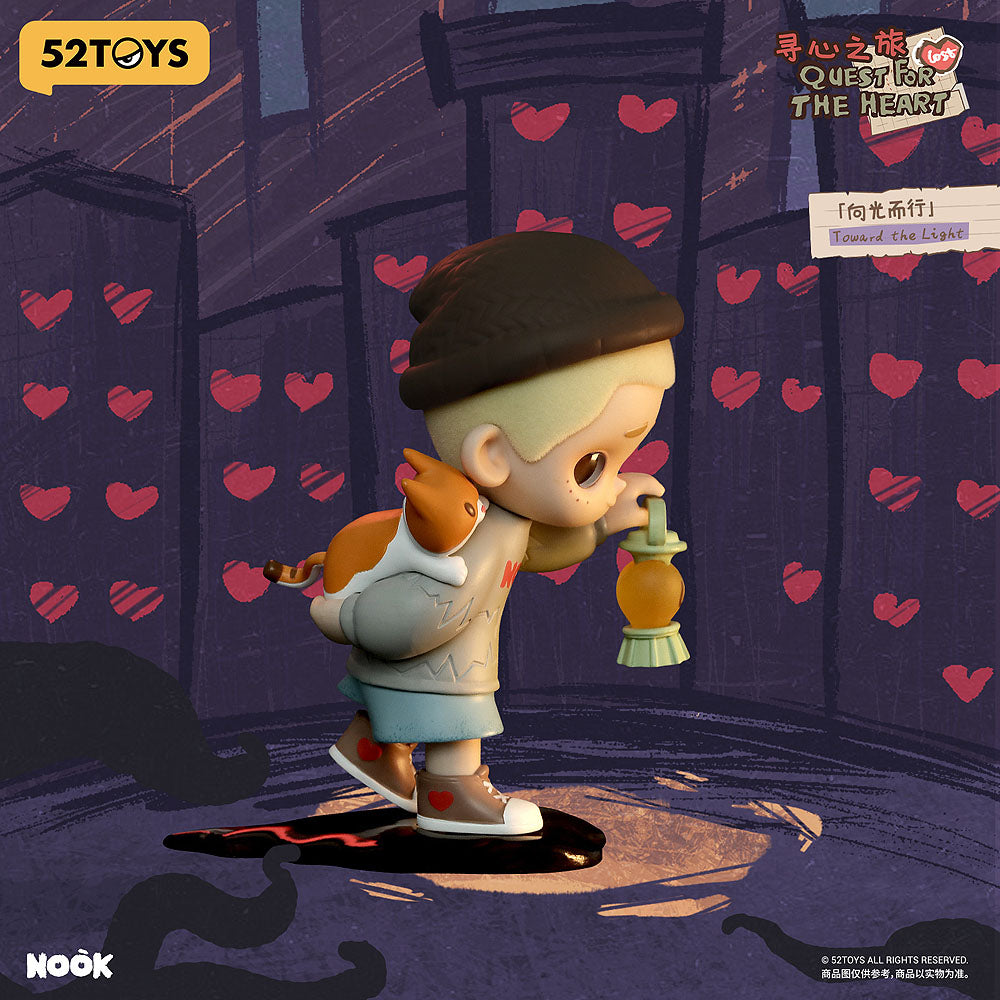 Toy figure of a character with a hat and backpack in a stylized setting with hearts.
