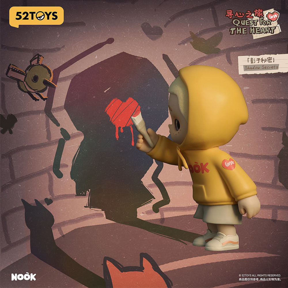 Illustration of a character in a yellow hoodie holding a red heart and an umbrella, with '52TOYS' branding.