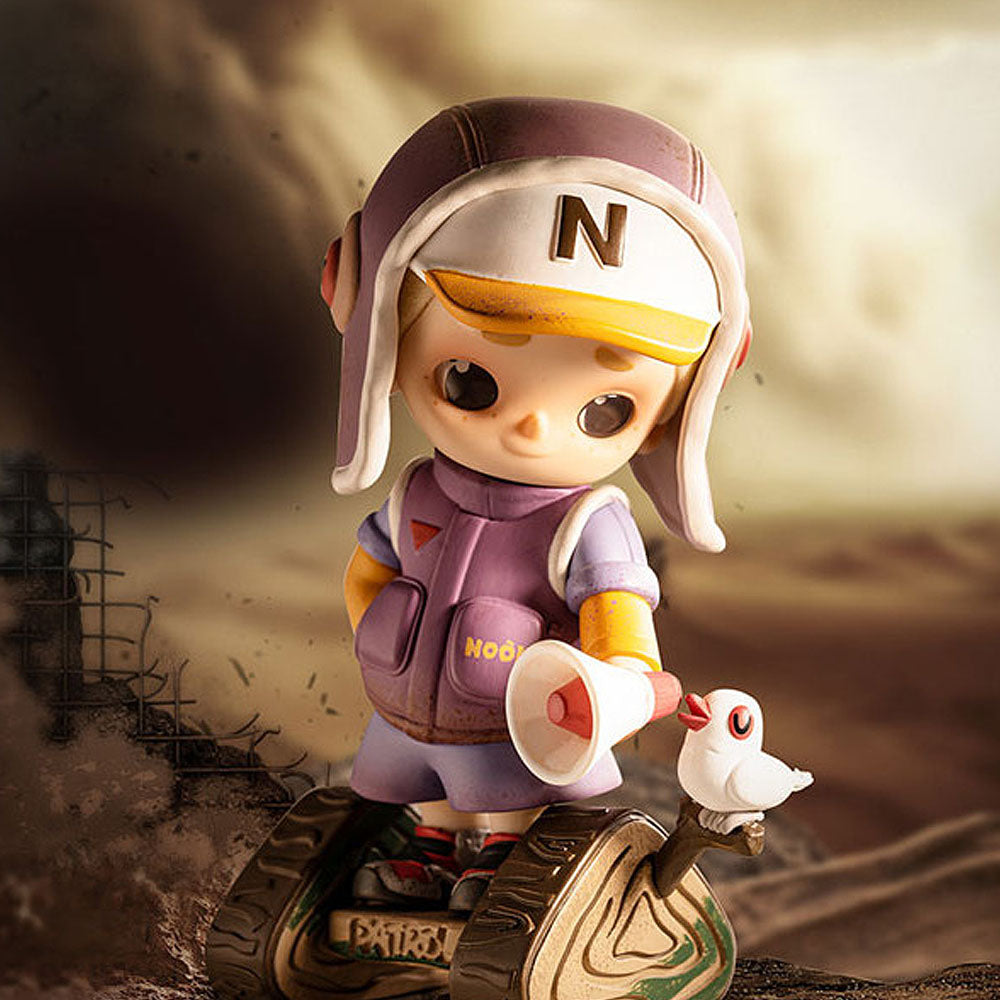 Toy figure with a megaphone and bird in a desert-like setting