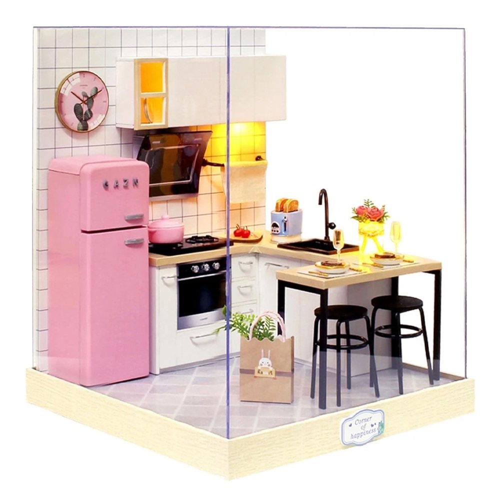 A detailed 3D DIY miniature kitchen model featuring a pink retro refrigerator, white cabinetry, and a small breakfast bar with stools