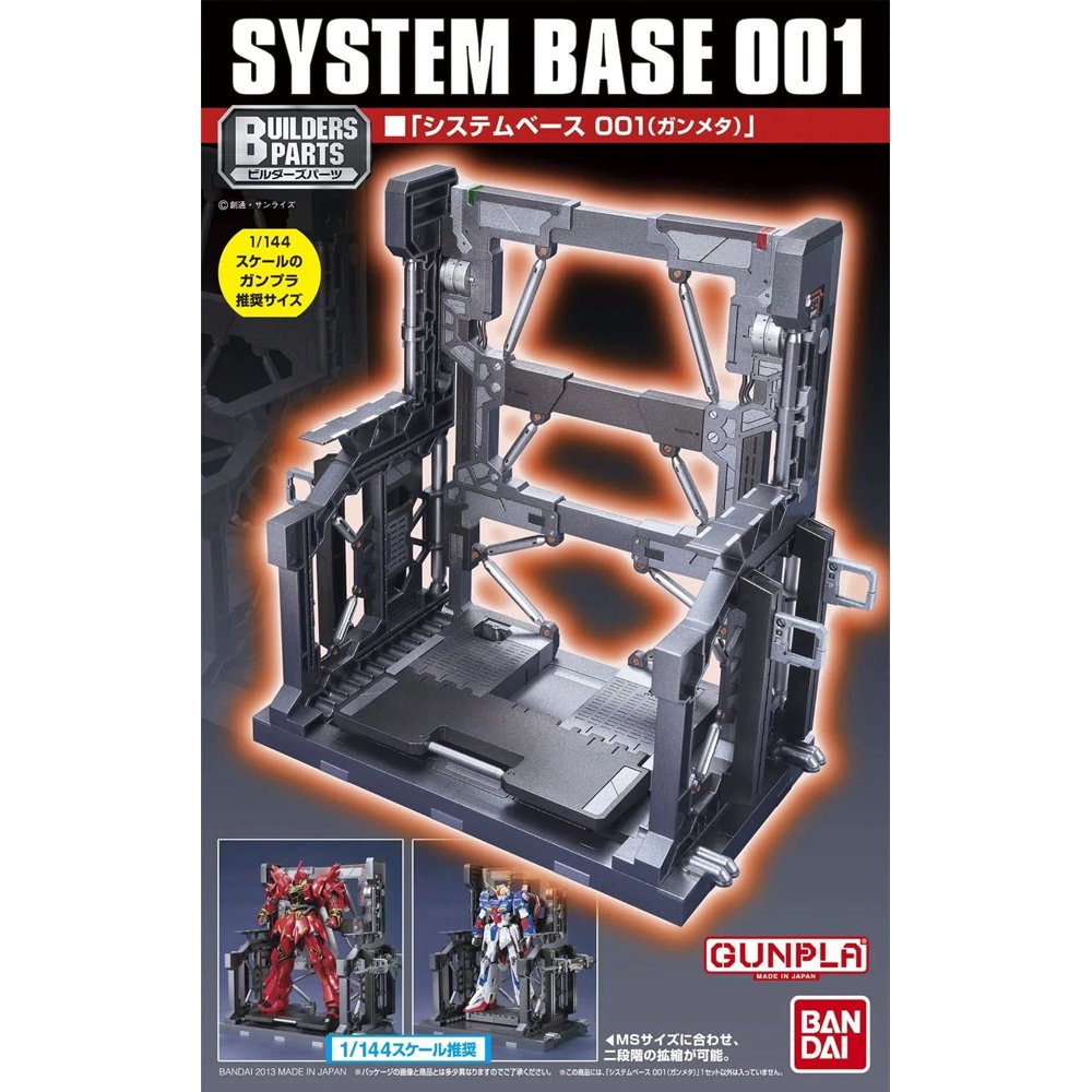 An officially licensed Bandai System Base 001 model kit display stand in metallic gunmetal gray. The retail packaging shows the mechanical hangar holding 1/144 scale Gunpla figures, highlighting its adjustable structural parts and industrial detail.