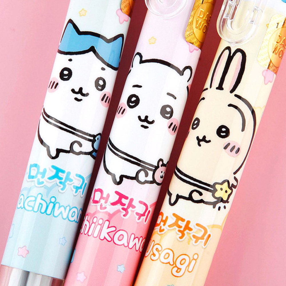 The officially licensed Chiikawa multi-color ballpoint pens in blue, pink, and yellow barrels. Each pen features a 3D character topper of Hachiware, Chiikawa, or Usagi and contains six different ink colors.