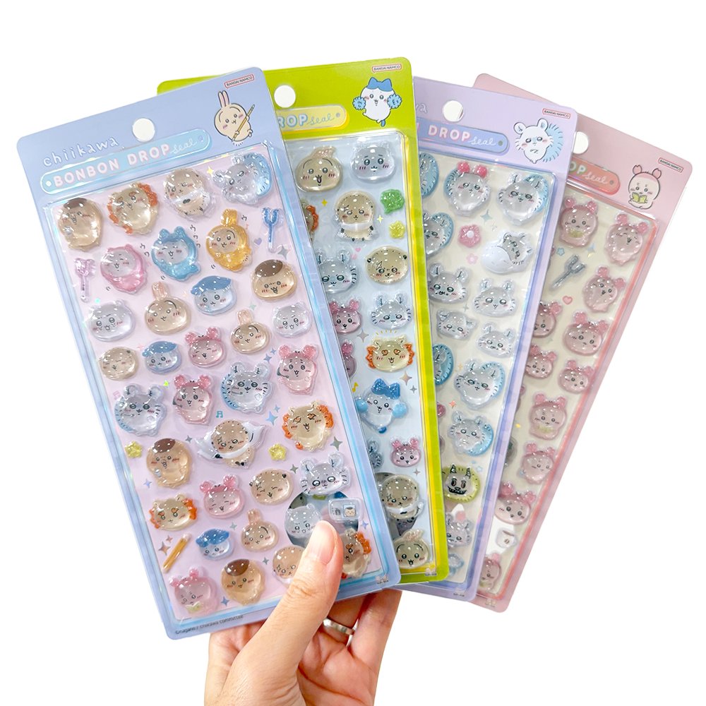 Four colorful officially licensed Chiikawa and Friends Bonbon Drop 3D resin sticker sheets, featuring Chiikawa, Hachiware, Usagi, and other fan-favorite friends in cute poses