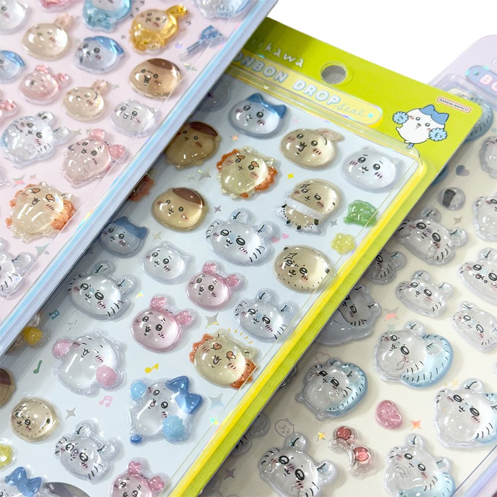 Four colorful officially licensed Chiikawa and Friends Bonbon Drop 3D resin sticker sheets, featuring Chiikawa, Hachiware, Usagi, and other fan-favorite friends in cute poses