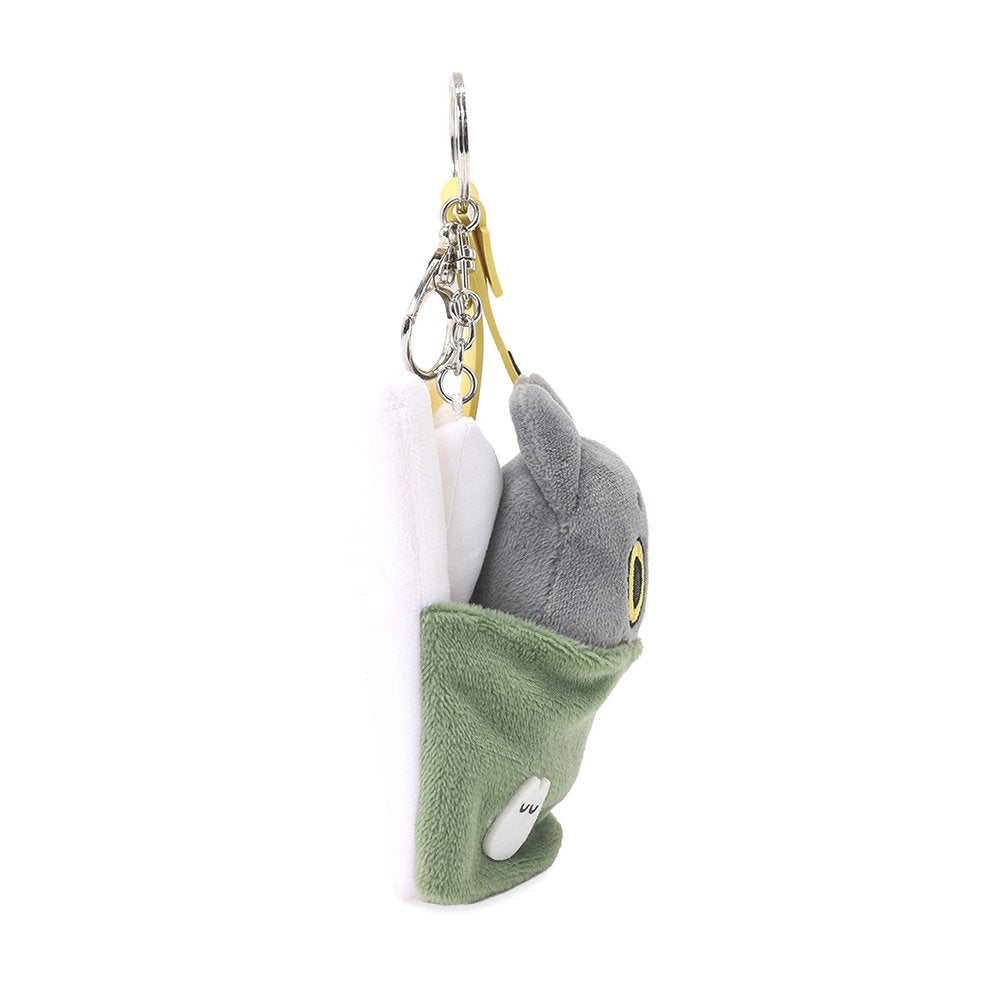 An officially licensed Hakongee cat plush keychain made by WSL, featuring the character tucked into a cozy green blanket with a pillow