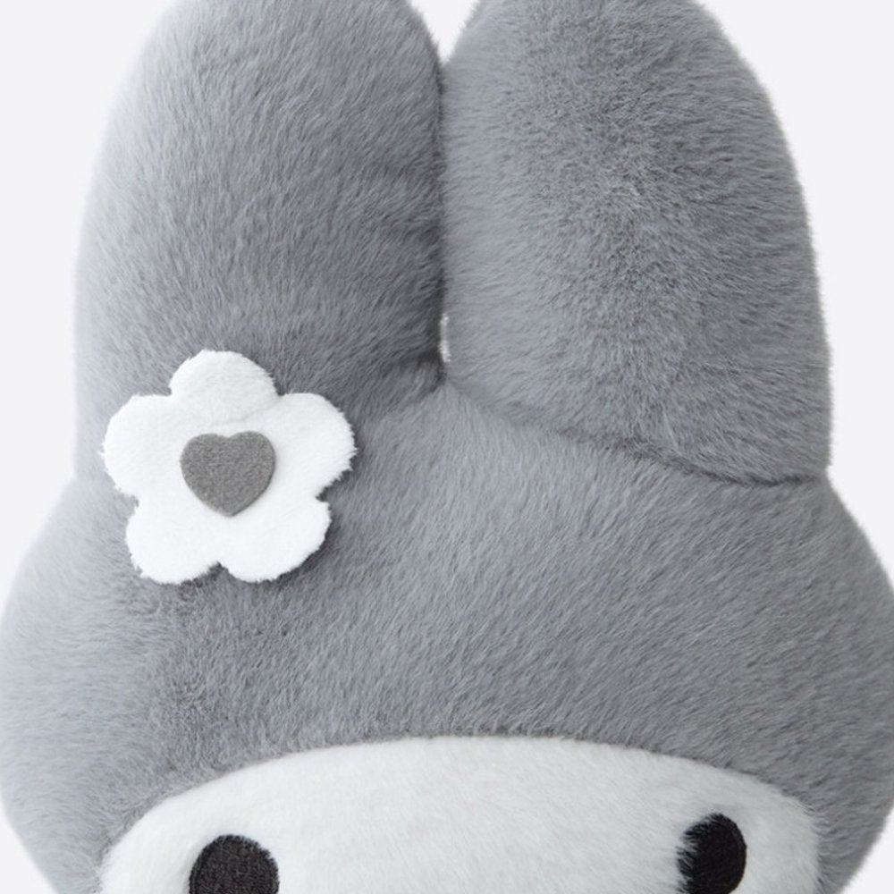 An officially licensed Sanrio Hello Kitty, Dear Daniel, My Melody, Cinnamoroll, Kuromi, Pompompurin, Pochacco, Chococat, and Hangyodon plush dolls each dressed in their iconic outfits in monochrom white and gray color