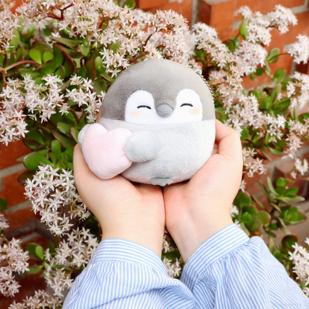 Penguin Plush 4 Inch Keychain: Person holding a Koupen Chan Penguin Plush 4 inch holding a pink heart. Official licensed charm, made from soft Polyester Fiber.