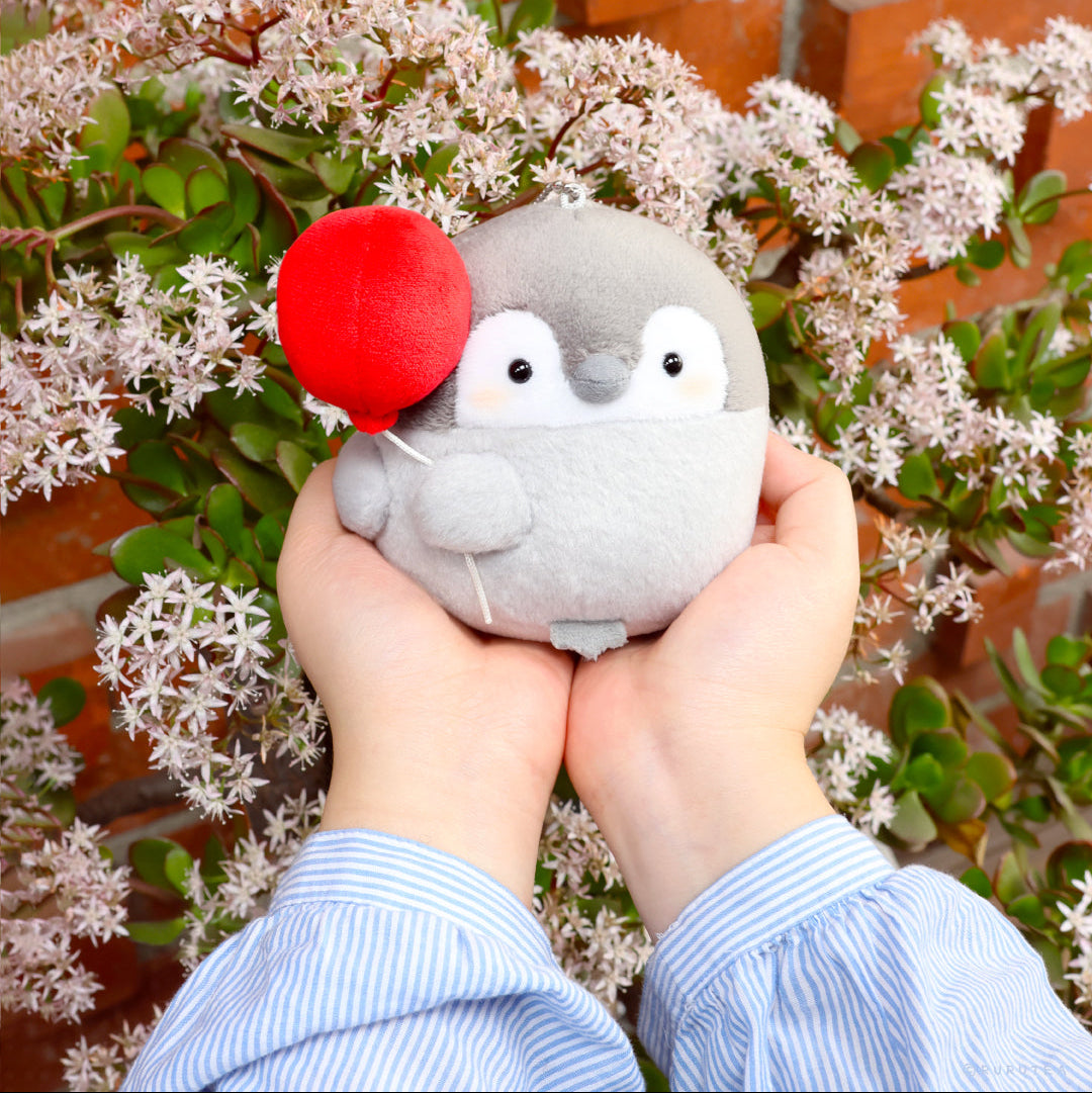 Penguin Plush 4 Inch Keychain: Person holding a Koupen Chan Penguin Plush 4 inch holding a red balloon. Official licensed charm, made from soft Polyester Fiber.