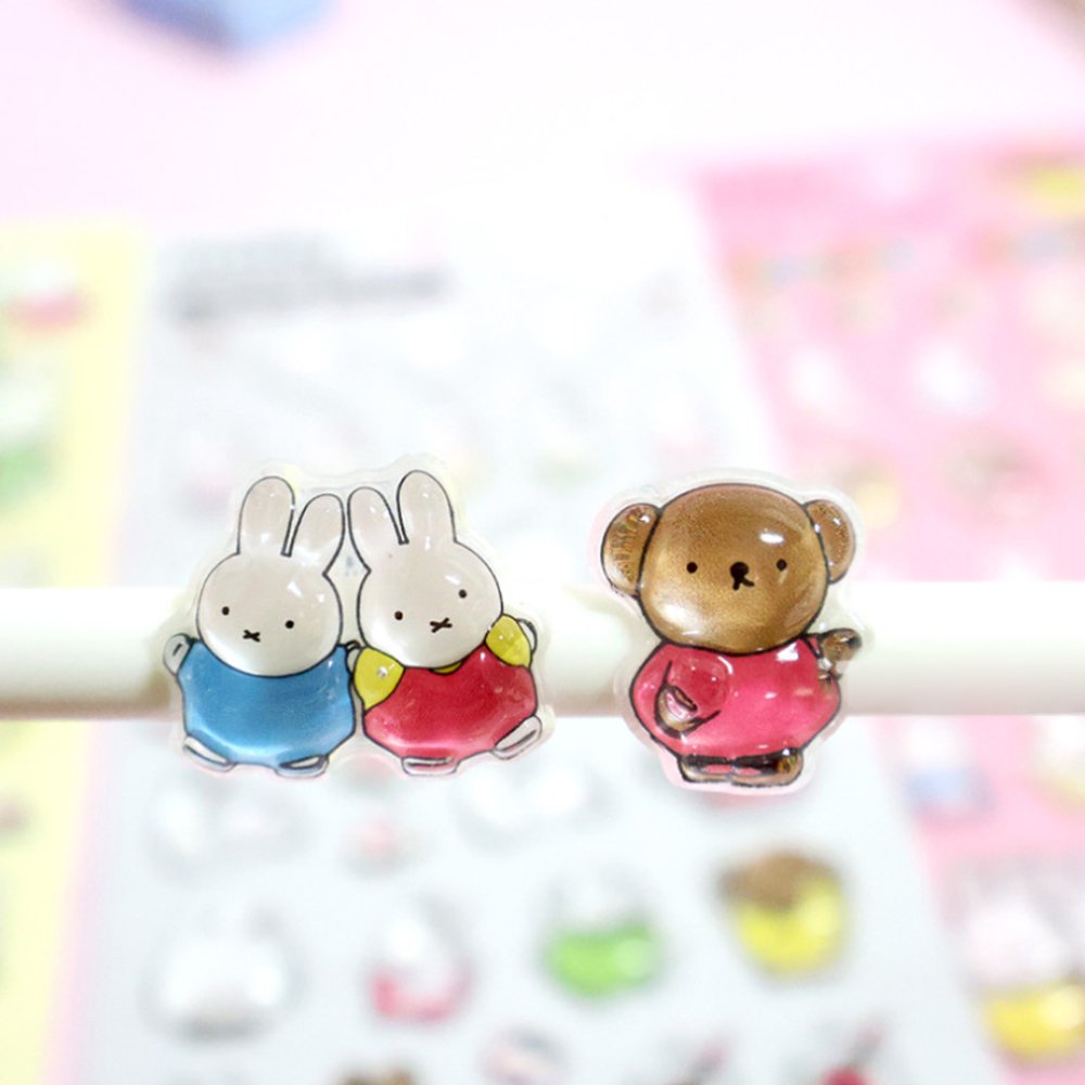 Four colorful sheets of officially licensed Miffy crystal stickers in yellow, white, pink, and blue. The 3D-raised glossy stickers feature Miffy, her friends, animals, and cute icons.