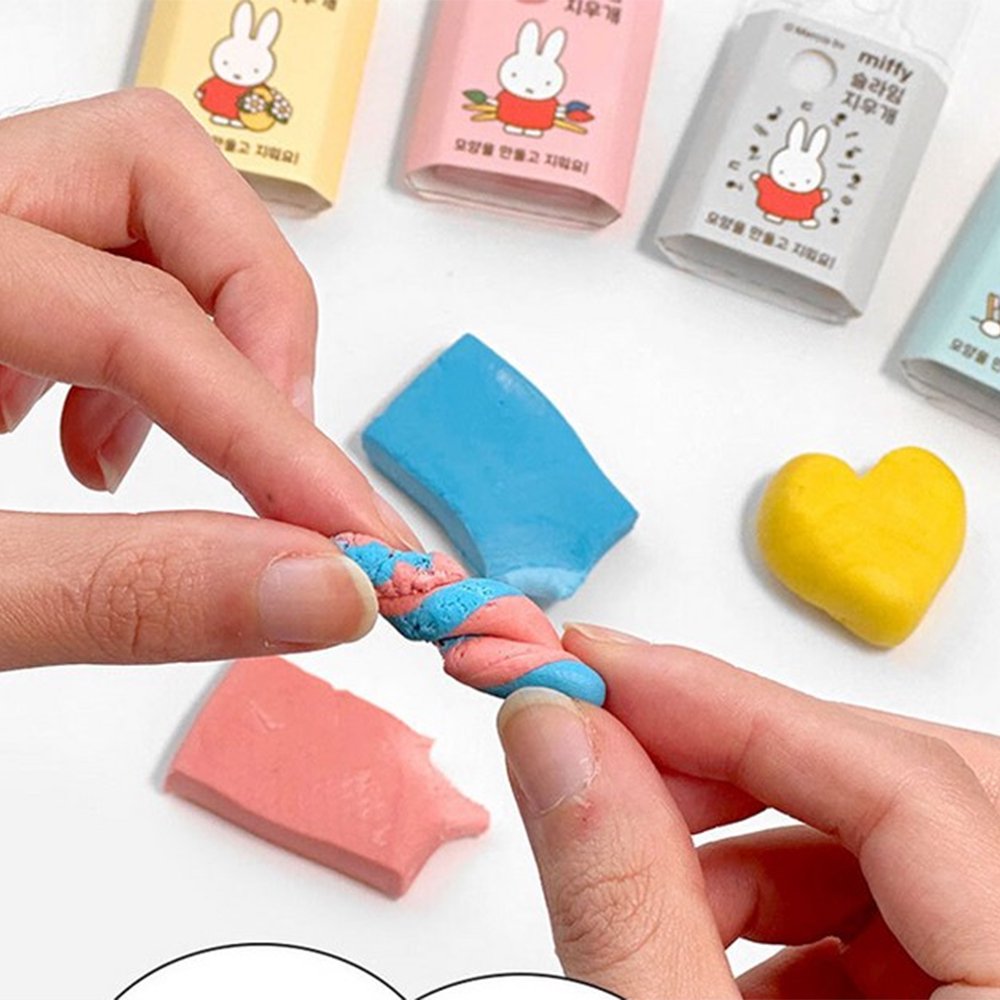 Officially licensed Miffy kneadable slime erasers in pastel-colored boxes, shown with small molded Miffy figures and stretched eraser material.