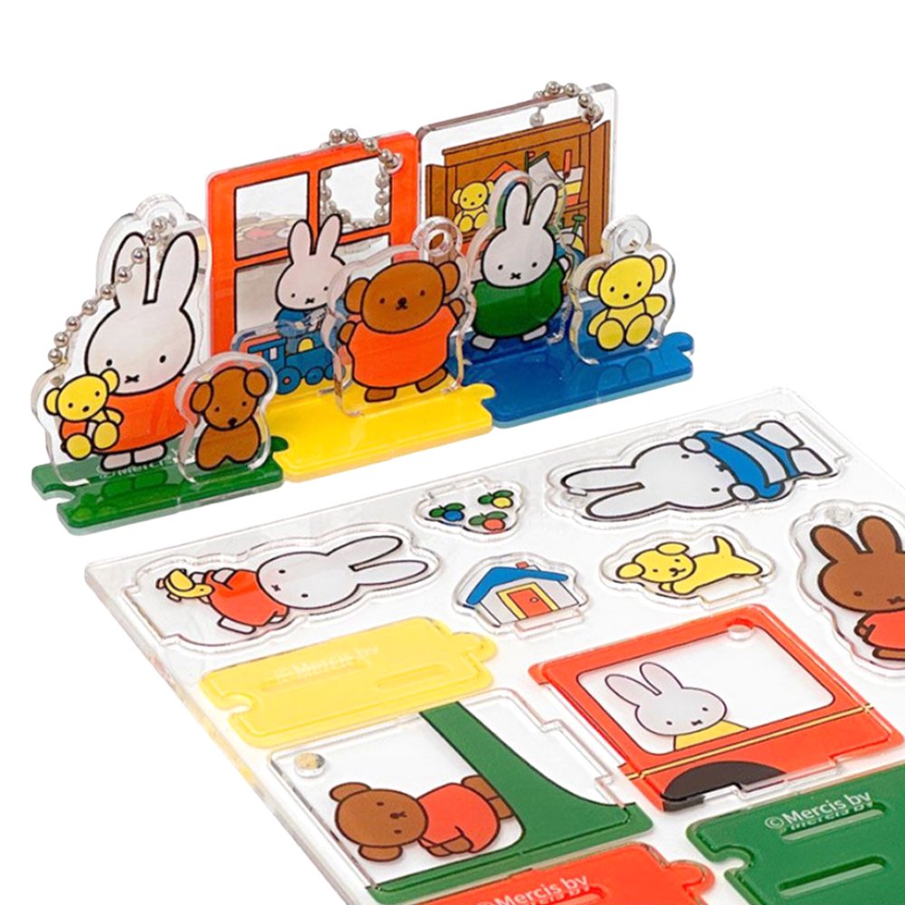 Officially licensed Miffy and Friends acrylic diorama set featuring pop-out characters like Miffy and Boris Bear, colorful scenery pieces, and silver ball chains for keychain use.