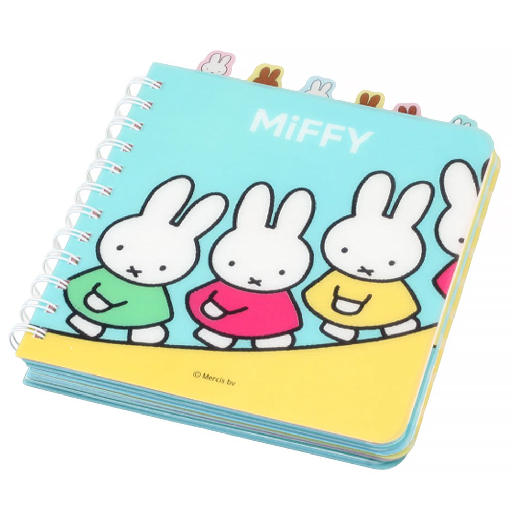 Officially licensed Miffy spiral notebooks in pink and blue, featuring die-cut character tabs of Miffy and friends along the top edge and white spiral binding.