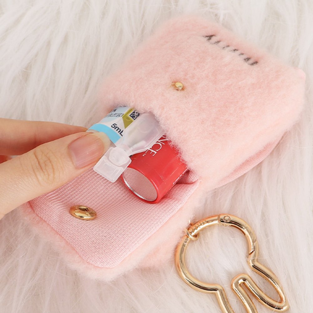 An officially licensed Miffy plush mini backpack pouch keychain in brown, ivory, pink, and black, featuring a gold bunny shaped clip.