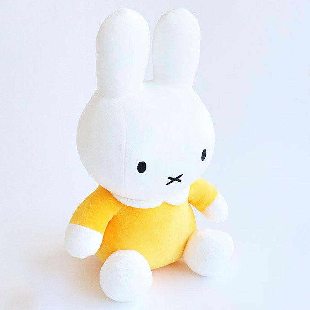 Officially licensed by Miffy yellow sitting Plush on a white background. She's perfect for displaying, decoration or gift to Miffy fans of all ages.