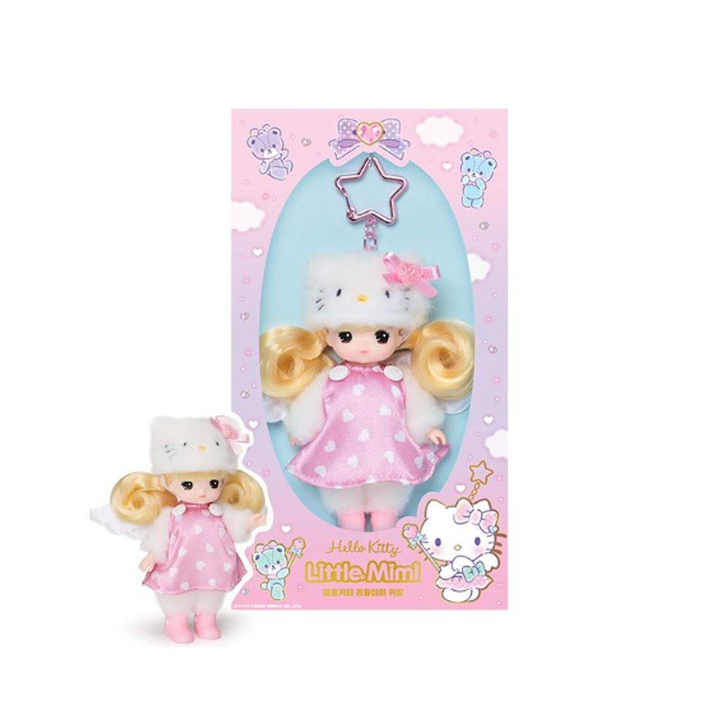 Officially licensed Sanrio and Little Mimi Collaboration Doll Keychain Collection featuring a blonde mini doll wearing a fuzzy white Hello Kitty hat with a pink bow, a pink satin dress with white heart patterns, white angel wings, and pink boots, attached to a pink star shaped metal clasp, ideal for adult kidult collectors as a cute aesthetic backpack charm or nostalgic collectible accessory.