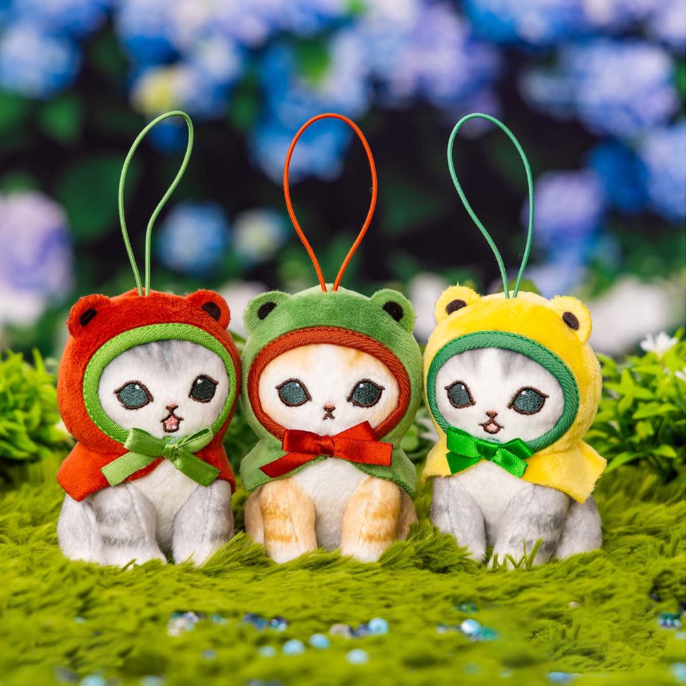 An officially licensed Mofusand plush mascot keychains of three kittens, each wearing a frog hood with a bow