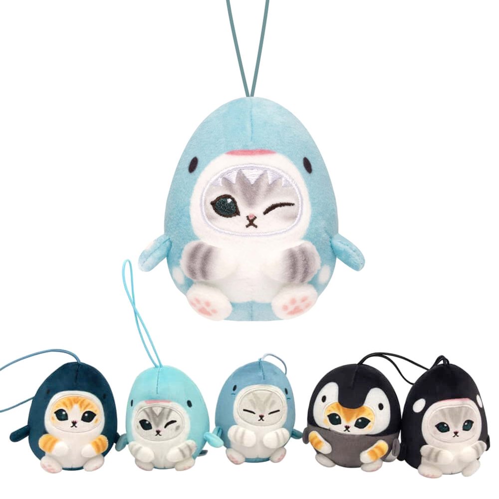 Five officially licensed Mofusand plush keychains featuring small cats wearing various marine animal costumes like blue sharks, a black orca, and a grey penguin. The cats are depicted with cute expressions, including one winking and one with its eyes closed in a happy smile.