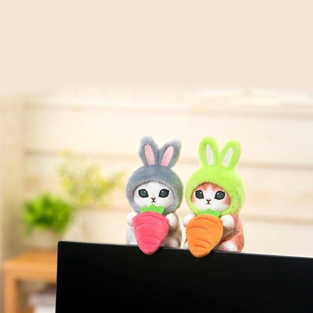 Officially licensed Mofusand cat in a bunny rabbit costume holding a carrot plush