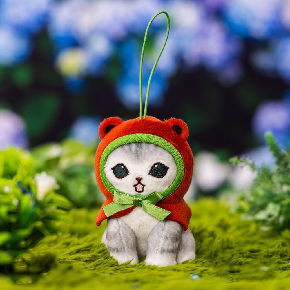 An officially licensed Mofusand plush mascot keychain featuring a small grey cat wearing a red frog-themed hood with a red bow