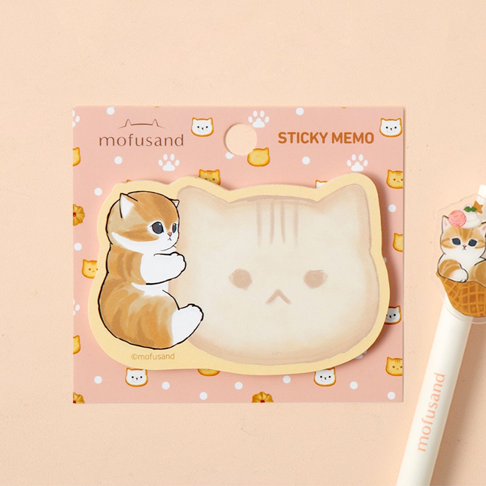 An officially licensed Mofusand die-cut sticky memo pad featuring a brown tabby kitten hugging a cat-shaped writing note