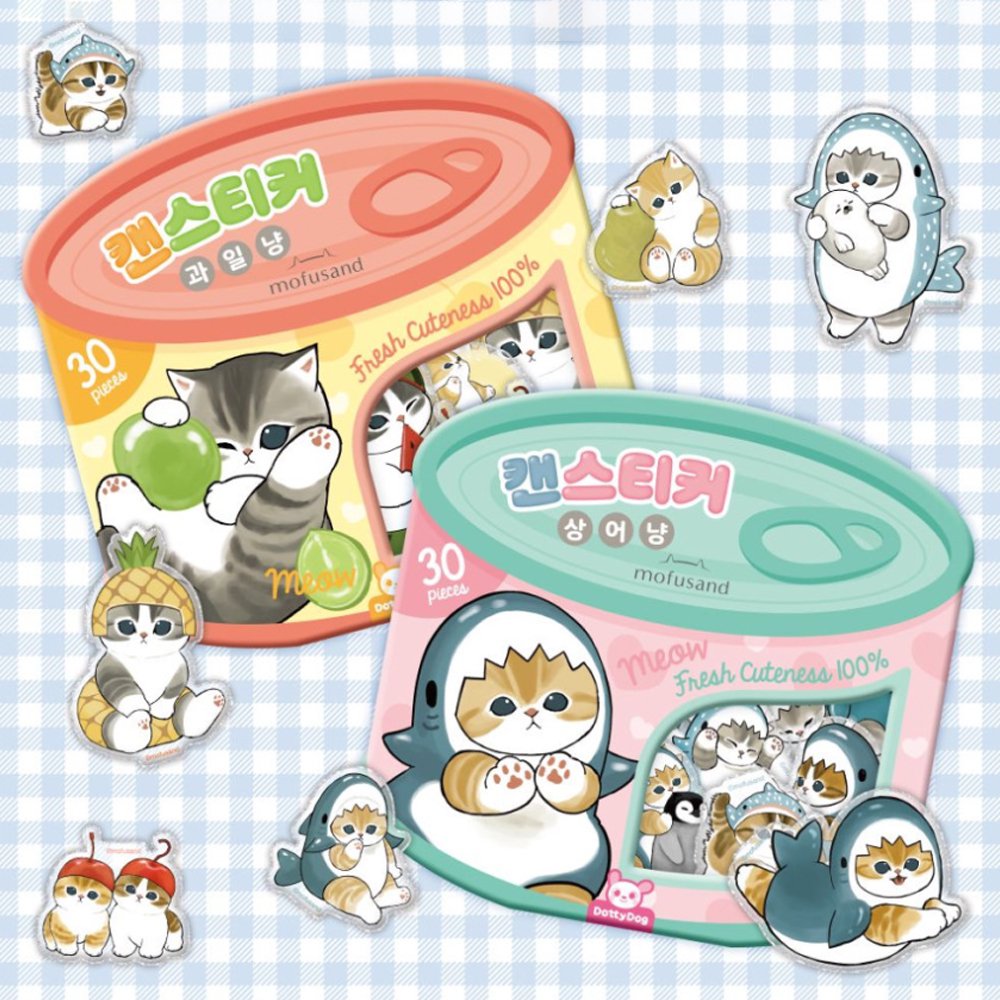 An officially licensed Mofusand sticker set packaged in a pink and teal tin designed to look like a cat food can. A clear window on the front reveals several die-cut stickers of cats in shark costumes, with "30 pieces" and "Fresh Cuteness 100%" printed on the label.
