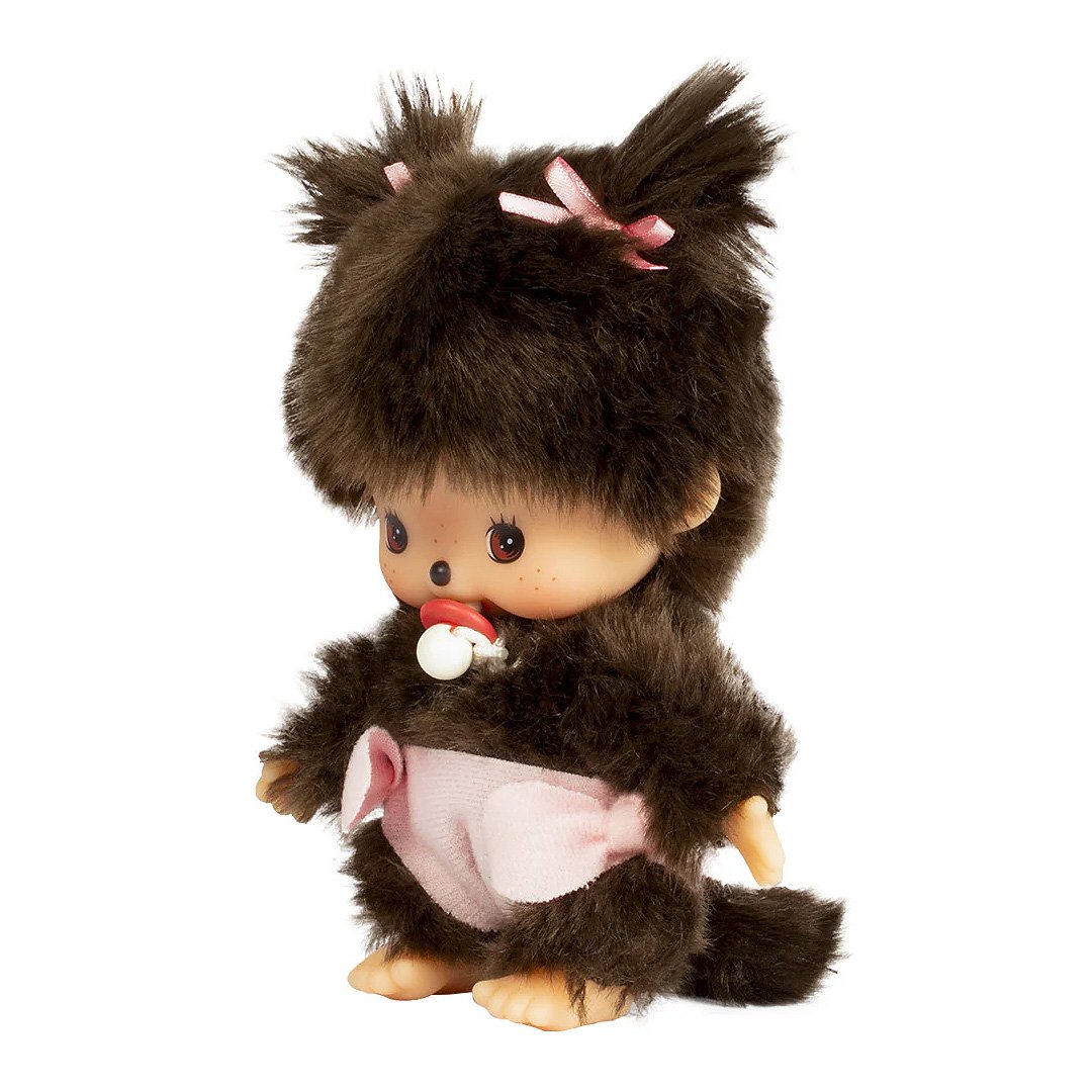 Official license Mochhichi dressed in baby suits with bows, these baby Monchhichis come with a tiny pacifier for an extra sweet touch. Their soft plush material and charming baby-style outfits make them the perfect collectible or gift for Monchhichi fans.
