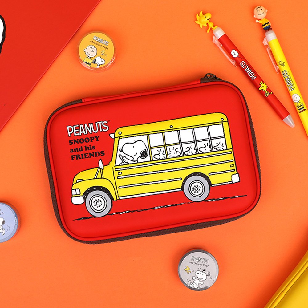 Officially licensed Peanuts hard shell pencil cases in yellow, red, pink, and grey featuring Snoopy, Charlie Brown, and friends
