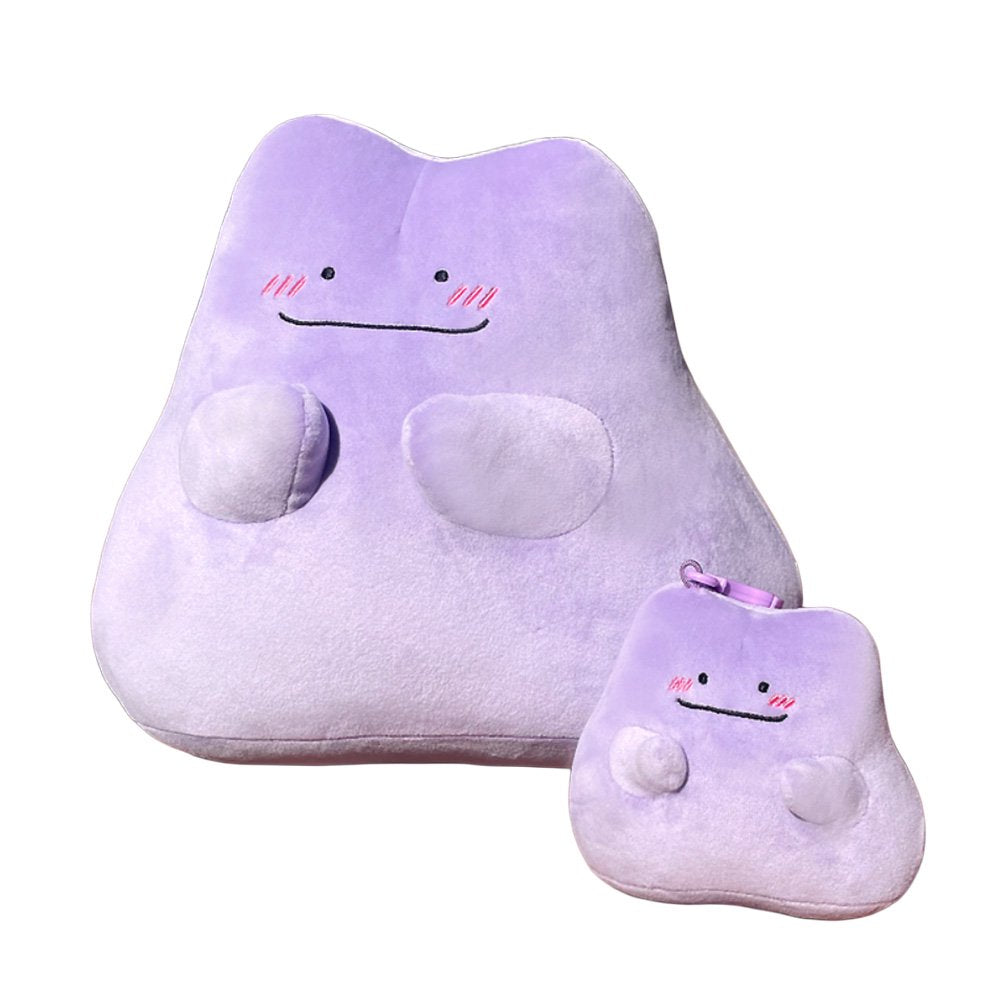 An officially licensed Pokémon Ditto plush toy and plush keychain in a vibrant light purple color, featuring a simple smile, and three pink diagonal lines on each cheek to represent blushing.