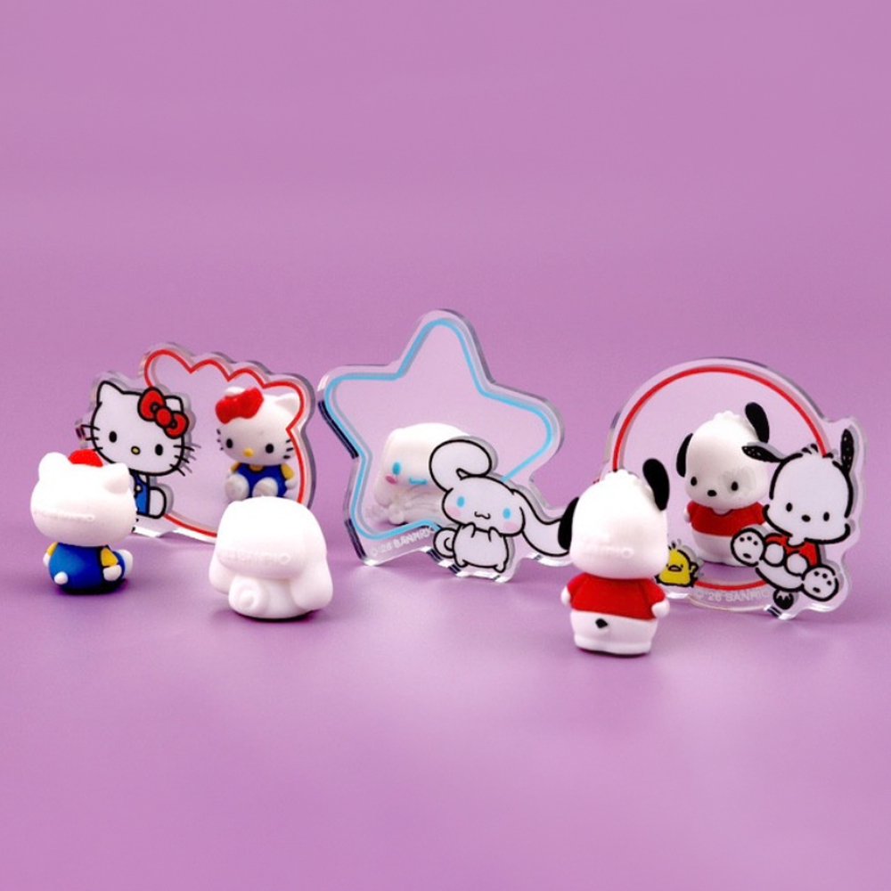 A collection of ten colorful, die-cut acrylic mirrors featuring officially licensed Sanrio characters like Hello Kitty, My Melody, and Cinnamoroll. Each mirror includes a character illustration next to a small reflective surface in various shapes like stars, clouds, and hearts.