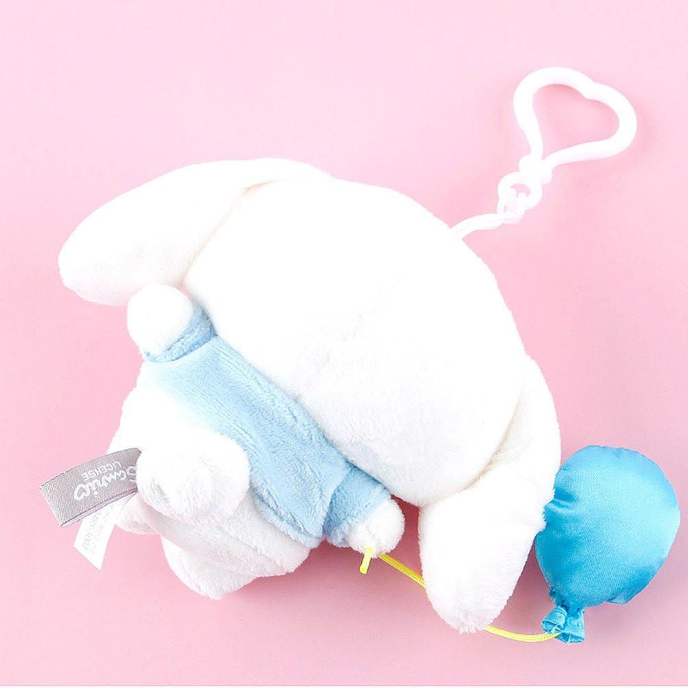 Sanrio Cinnamoroll Plush toy with blue balloon on a pink background