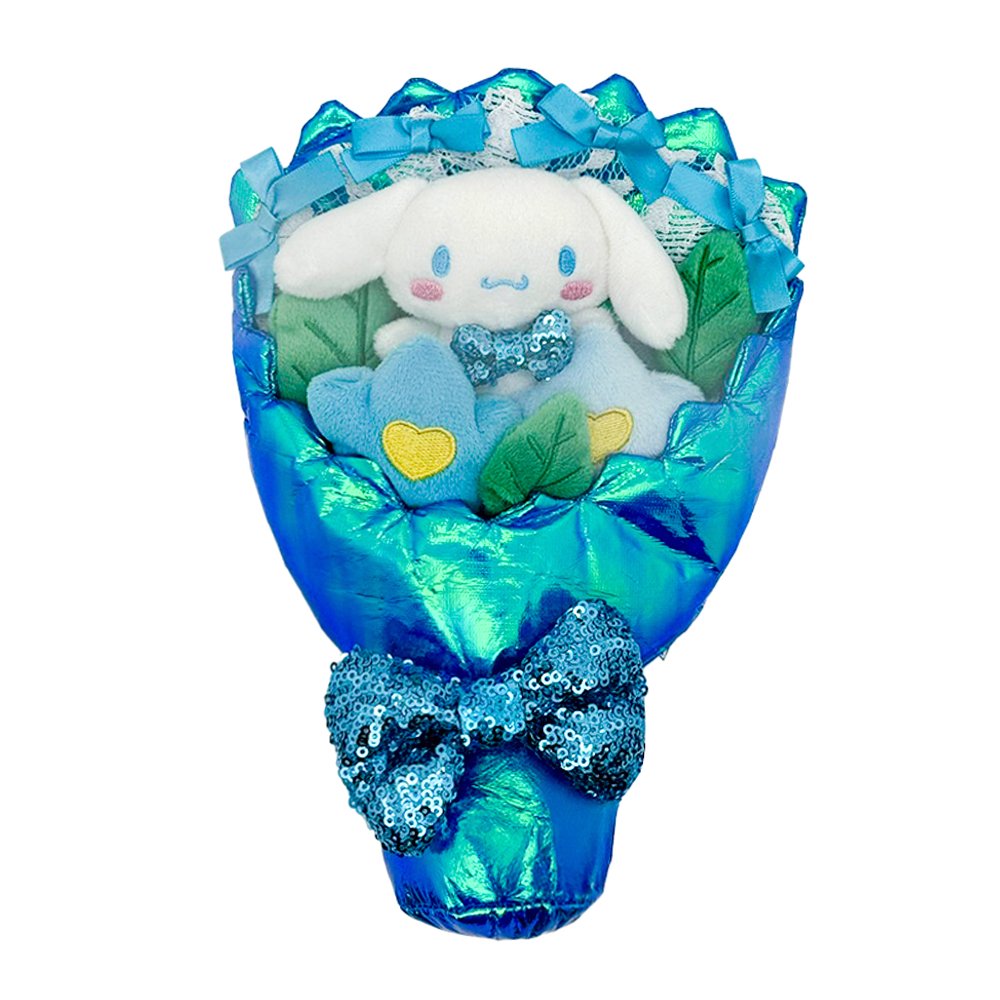 An officially licensed Sanrio Cinnamoroll plush bouquet featuring a white plush character and blue flowers wrapped in shimmering iridescent blue fabric. The bouquet is decorated with blue satin bows and a large, sparkling blue sequined bow at the bottom.