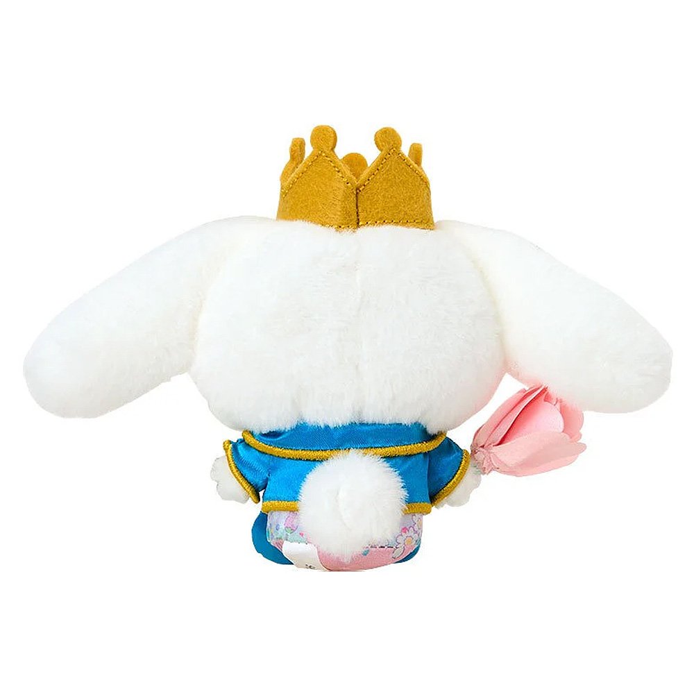 Sanrio Cinnamoroll plush keychain dressed as a prince in a blue and gold royal suit with a matching crown, holding a pink fabric tulip, attached to a silver metal lobster clasp.