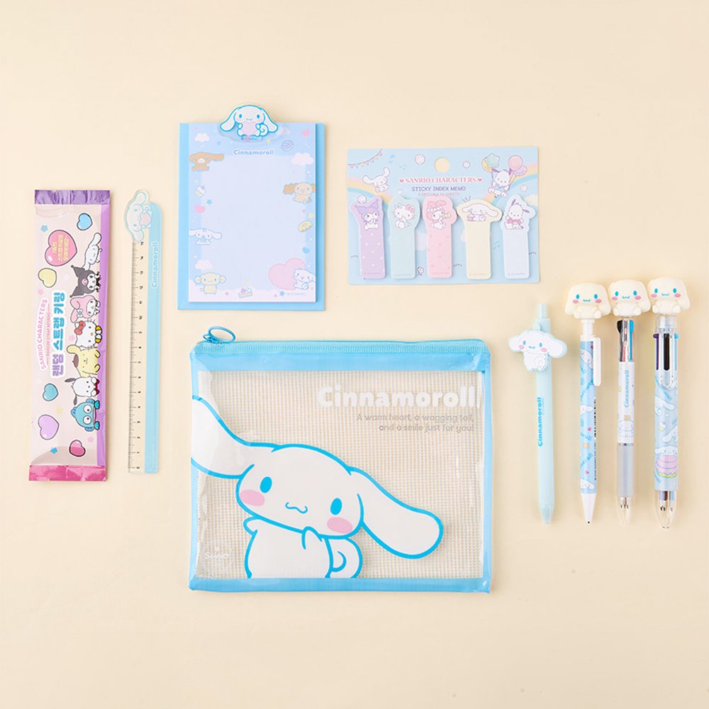 Officially licensed Sanrio Cinnamoroll stationery set featuring a clear zipper pouch, character-topped pens, sticky index memos, memo pad, random strap keychain, and a themed ruler.