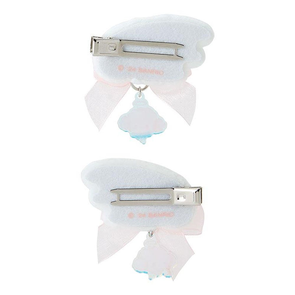 Two hair clips with white bows and cogimyun charm accents on a white background