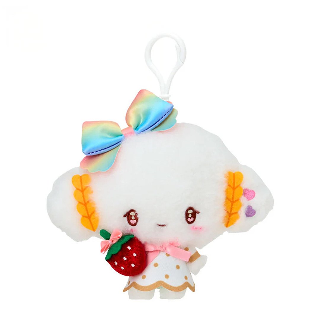 Officially licensed by Sanrio Cogimyun dressed in elegant white outfits with gold polka dots and vibrant rainbow bows, this large cast of beloved she is holding a velvet strawberry and features detailed embroidered heart accents in eyes their eyes. Perfect for adding a nautical touch of kawaii style to your bag, keys, or backpack.