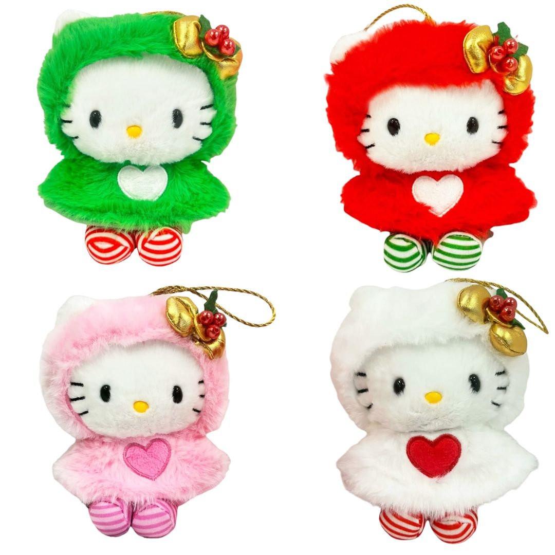 Collectible Sanrio Hello Kitty bag charms or Christmas ornaments featuring four different furry cape designs, perfect for holiday decorating and accessorizing.