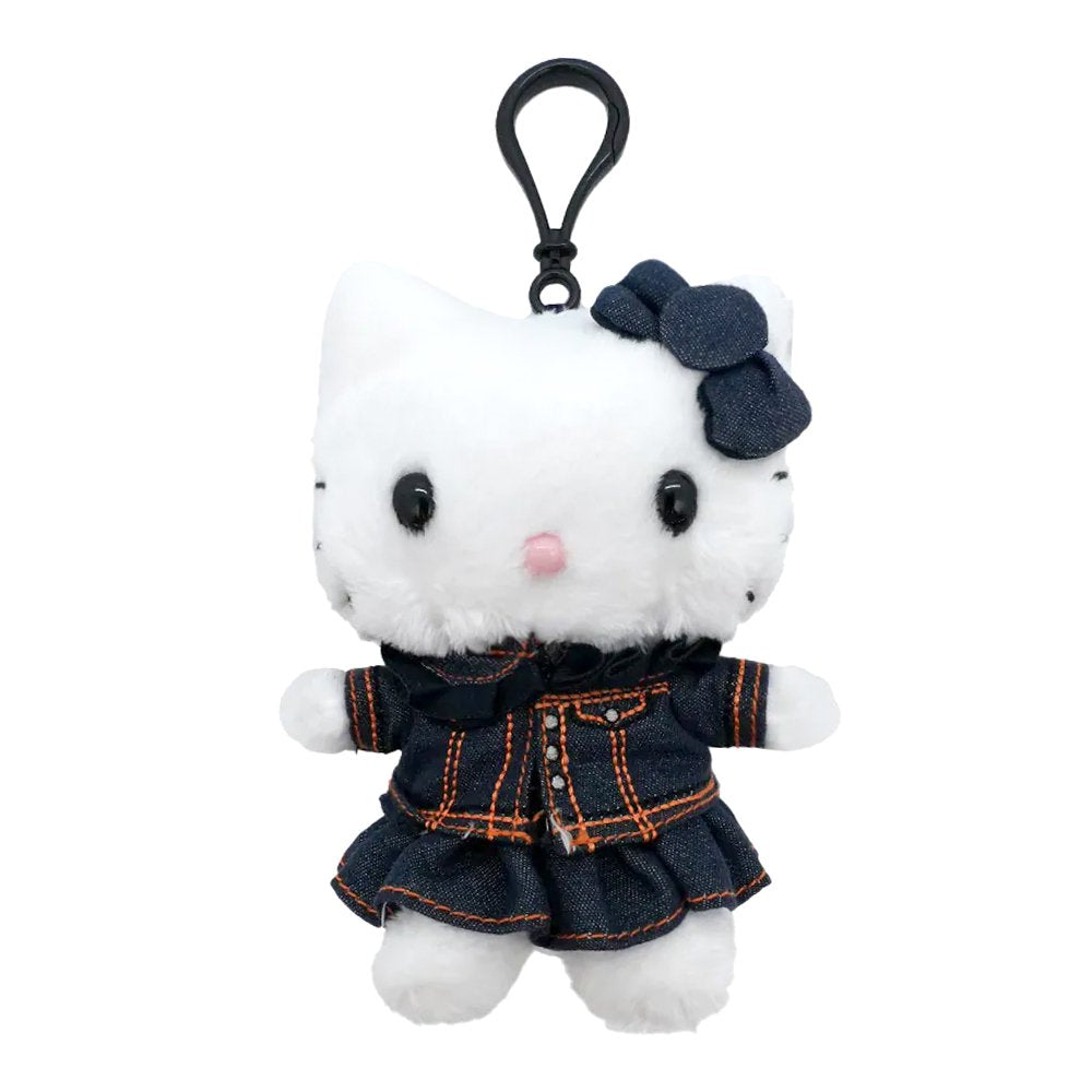 Officially licensed Sanrio Hello Kitty plush keychain wearing a dark-wash denim jacket and pleated skirt with high-contrast orange stitching and a matching denim bow