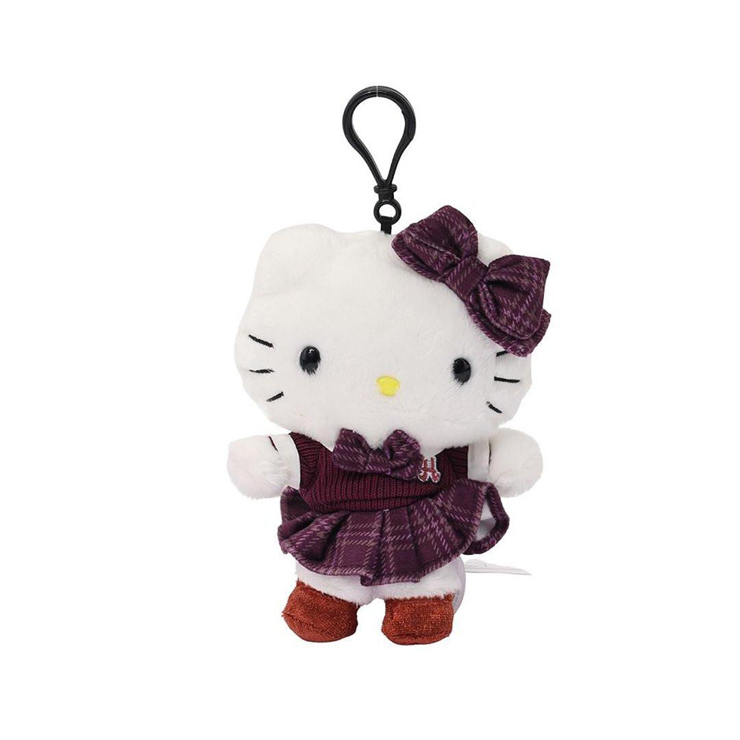 Officially licensed Hello Kitty bag clip plush doll wearing a maroon and plaid school uniform, featuring a large matching plaid bow and reddish-brown velvet feet. Perfect size to attach to your backpack, bag, purse, car, or pants. Ideal collectible toy for fans and Sanrio enthusiasts.