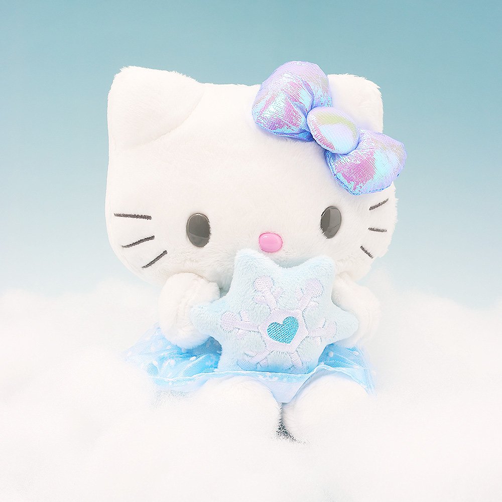 Sanrio Official license Hello Kitty Snow Angel 7-inch plush with iridescent bow, holding a blue snowflake, perfect for kawaii winter decor.