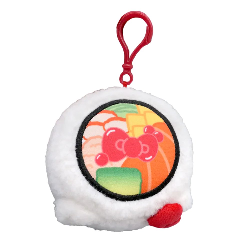 An officially licensed Sanrio Hello Kitty sushi plush keychain shaped like a round sushi roll with white sherpa fabric. The top features a printed sushi filling design, and the side includes Hello Kitty's face and a 3D red bow with a red plastic clip attached.