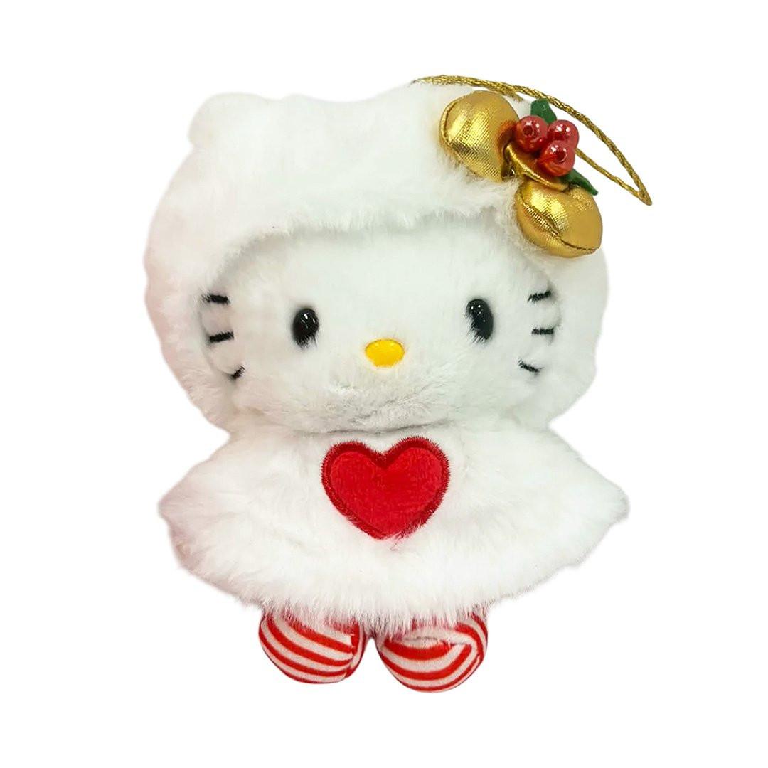 Collectible Sanrio Hello Kitty bag charms or Christmas ornaments featuring four different furry snow white cape designs, perfect for holiday decorating and accessorizing.