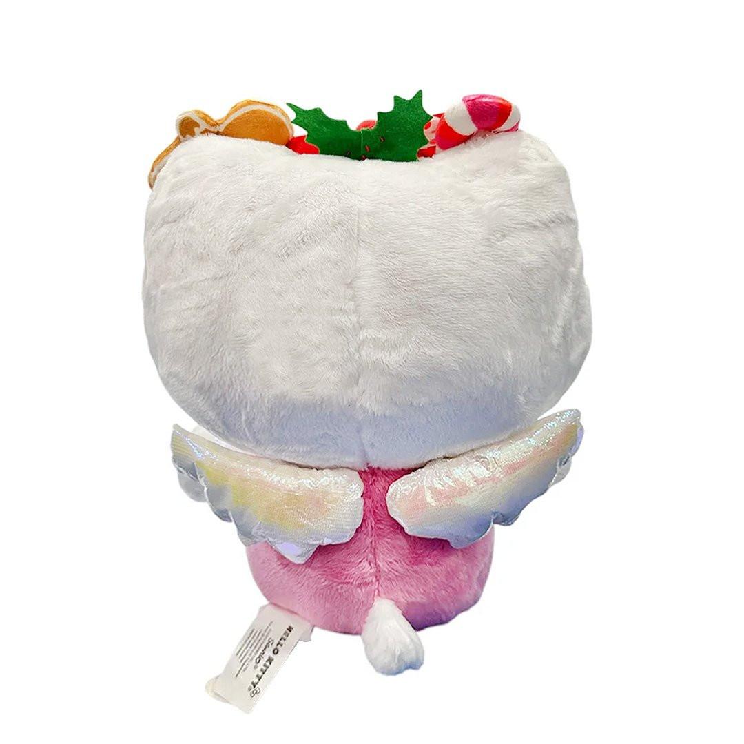 This exclusive Hello Kitty x Tokidoki collaboration is perfect for the holiday season. Her oversized head opens to reveal a collection of mini plush toys including a snowman with red and green buttons, a white polar bear in a red Santa hat, a festive gingerbread man with icing details, green holly leaves with red berries and candy cane. Hello Kitty herself features the signature Tokidoki heart and crossbones skull bow accent in her iconic red bow, along with soft pink cheeks and iridescent holographic wings