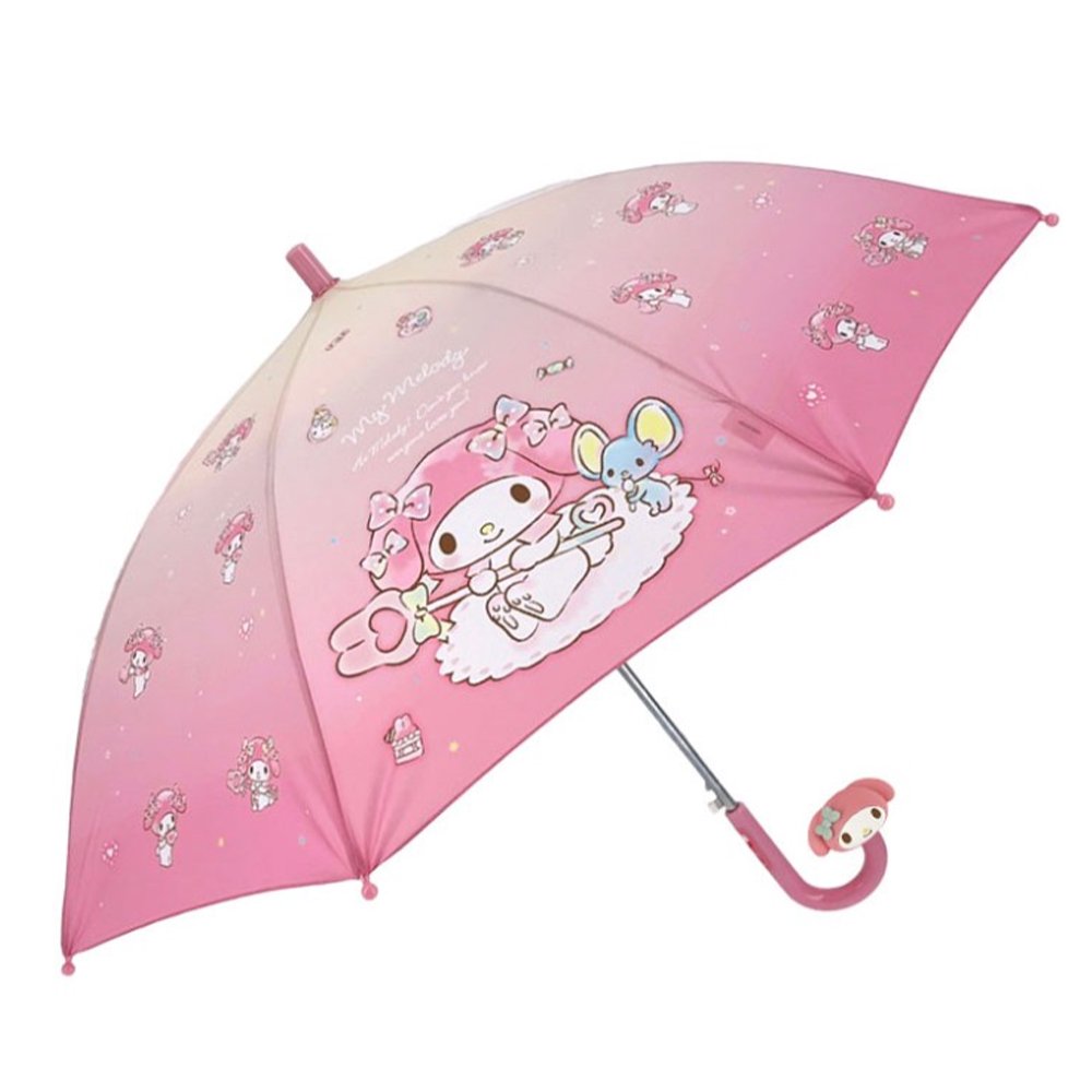 Pink Sanrio My Melody kids' umbrella featuring a pink gradient canopy with one clear see-through safety panel, finished with a 3D My Melody J-handle. Perfect for rainy day