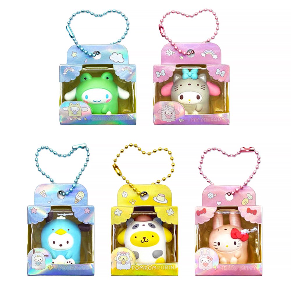 Five officially licensed Sanrio mini figures in colorful animal costumes, each packaged in a colorful box with a ball chain at the top. The collection includes Cinnamoroll, My Melody, Pochacco, Pompompurin, and Hello Kitty.