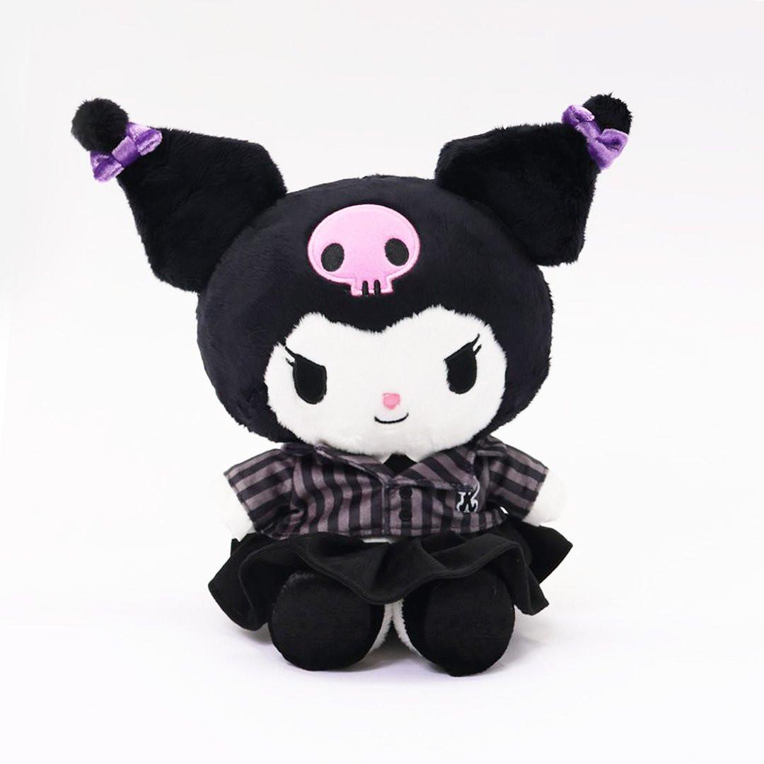 Officially licensed Sanrio Kuromi plush doll, wearing a black and white plaid school uniform dress with a black velvet pleated skirt. Kuromi's signature pink skull is embroidered on her black head.