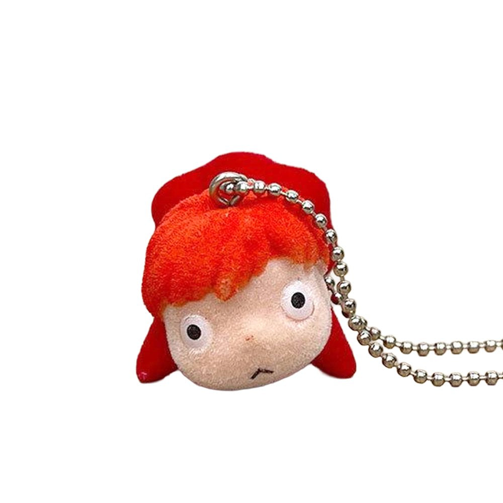 Officially licensed Studio Ghibli Ponyo on the Cliff by the Sea flocked keychain figure featuring Ponyo in her red fish form with a soft fuzzy texture and silver ball chain.