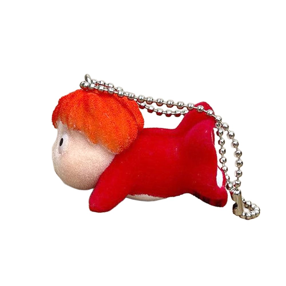 Officially licensed Studio Ghibli Ponyo on the Cliff by the Sea flocked keychain figure featuring Ponyo in her red fish form with a soft fuzzy texture and silver ball chain.