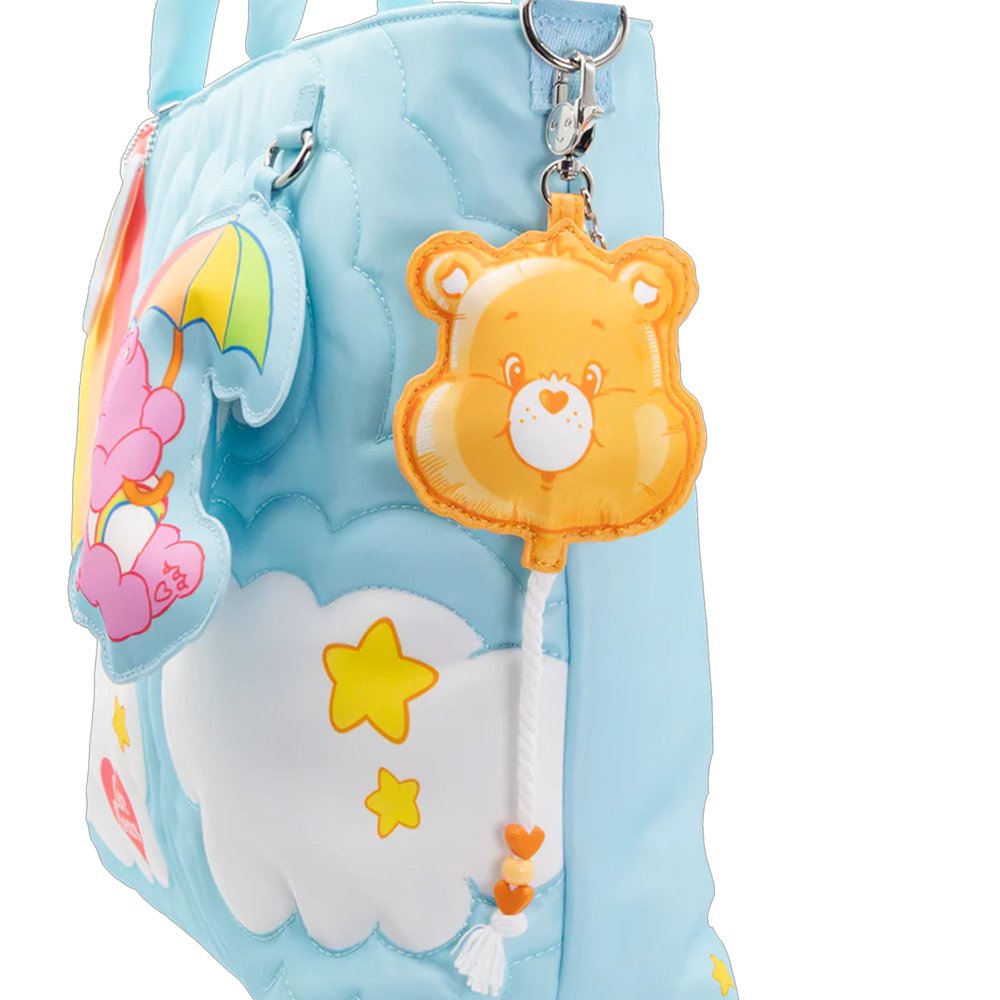 An officially licensed collection of six Care Bears face balloon-shaped mystery coin bag charm keychains in various colors