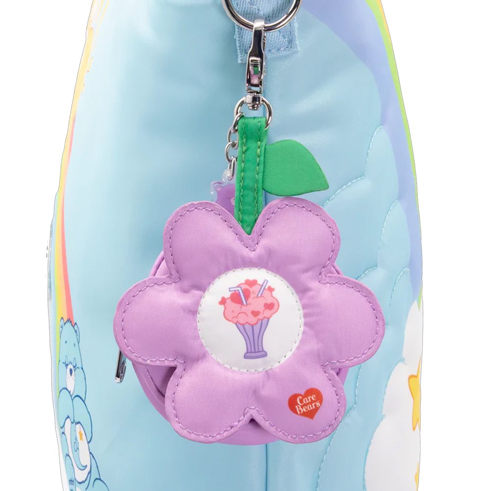 An officially licensed collection of six Care Bears flower-shaped mystery coin bag charm keychains in various colors